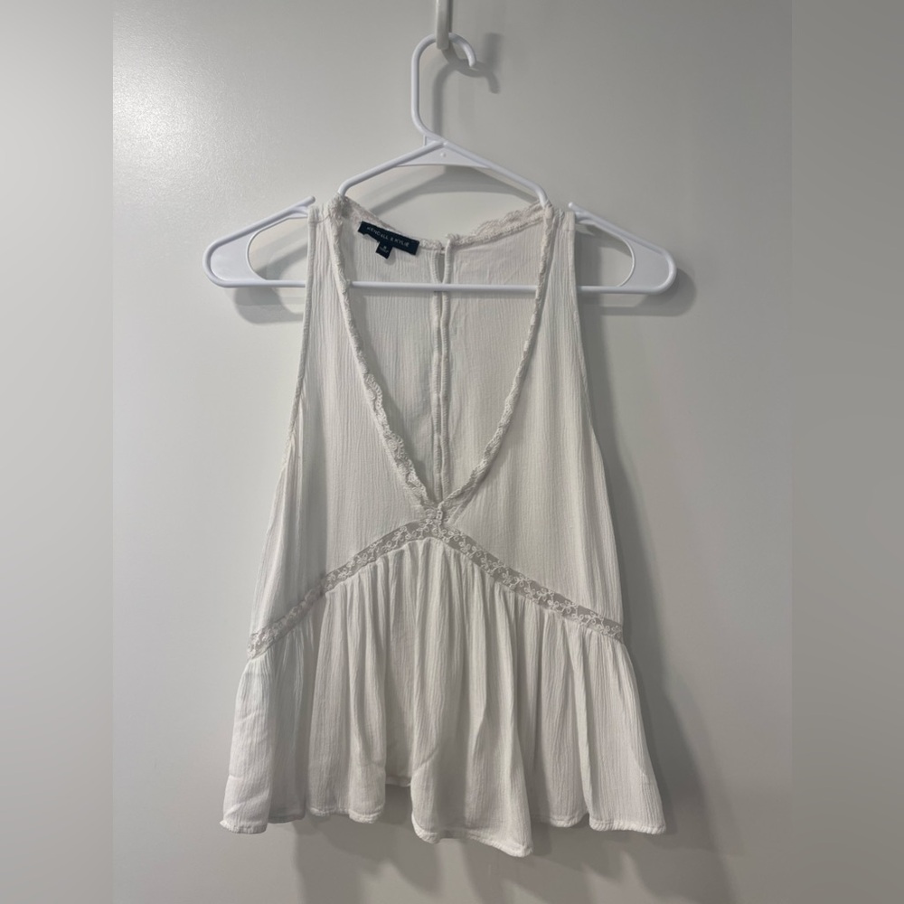 Kendall and Kylie white top